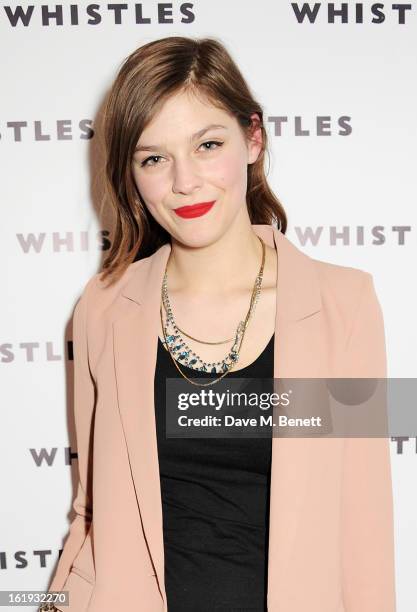 Amber Anderson attends the Whistles Limited Edition Autumn/Winter 2013 Collection party at The Arts Club on February 17, 2013 in London, England.