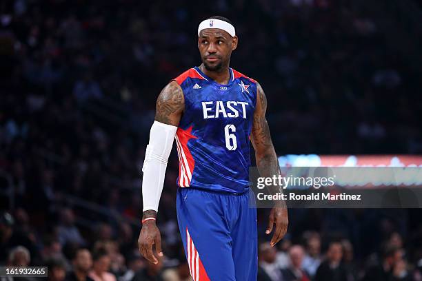 LeBron James of the Miami Heat and the Eastern Conference looks on in the first half during the 2013 NBA All-Star game at the Toyota Center on...