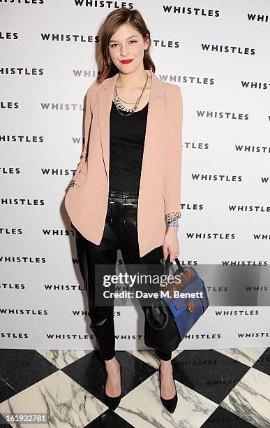 Amber Anderson attends the Whistles Limited Edition Autumn/Winter 2013 Collection party at The Arts Club on February 17, 2013 in London, England.