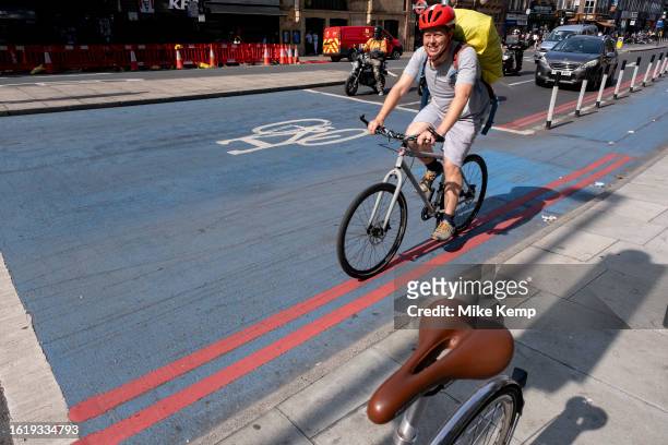 Cycle lane superhighway in Aldgate / Whitechapel on 16th August 2023 in London, United Kingdom. A cycle Superhighway is a long cycle path and part of...