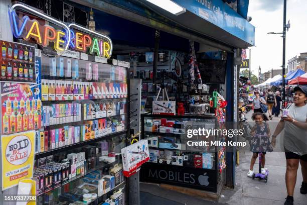 Vape shop selling disposable vapes along Bethnal Green Road in the East End on 16th August 2023 in London, United Kingdom. Vaping is often seen as a...