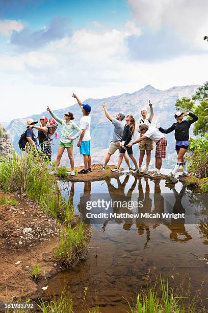 a family poses for a portrait during a hike - great american group stock pictures, royalty-free photos & images