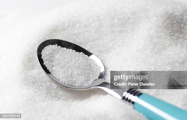 tea spoon of sugar - sugar ストックフォトと画像