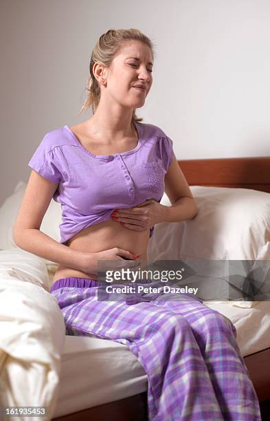 woman with stomach pains - food allergy stock pictures, royalty-free photos & images