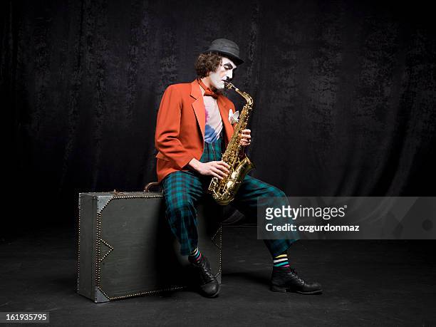 male actor playing clarinet - mime stock pictures, royalty-free photos & images