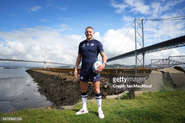 Finn Russell poses for photographs during the squad announcement prior to the Rugby World Cup on August 16, 2023 in South Queensferry, Scotland.