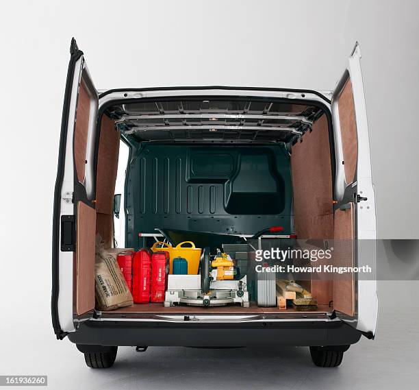 back of van with doors open and building materials - construction material foto e immagini stock