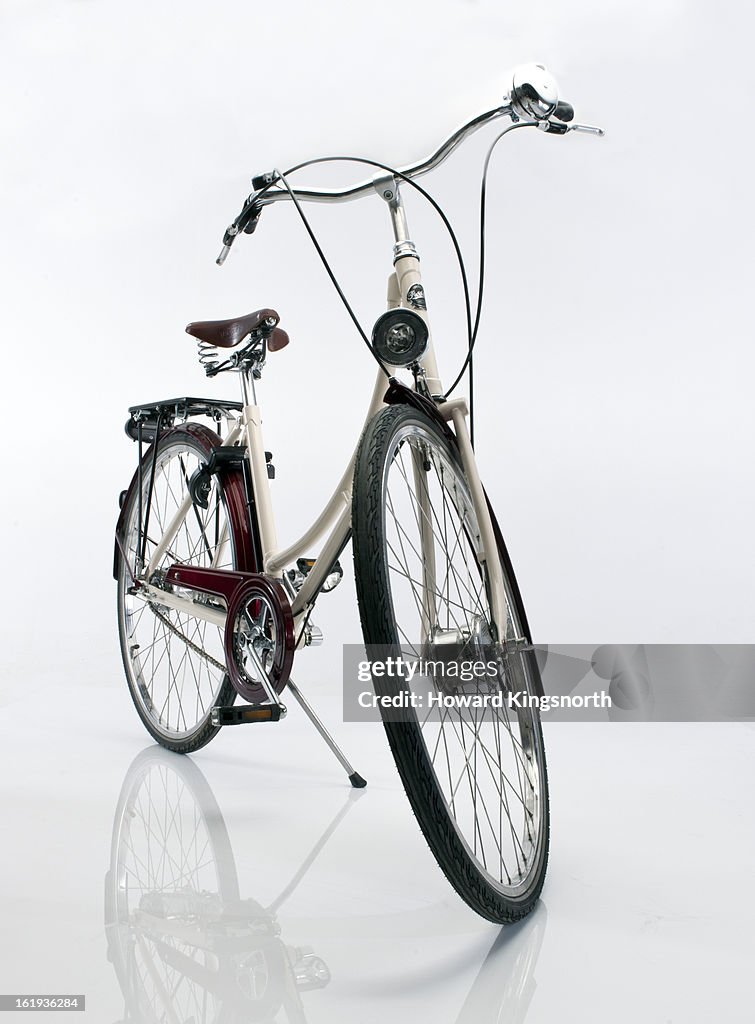 Ladies bicycle on white background