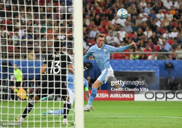 Cole Palmer of Manchester City scores the team's first goal during the UEFA Super Cup 2023 match between Manchester City FC and Sevilla FC at...