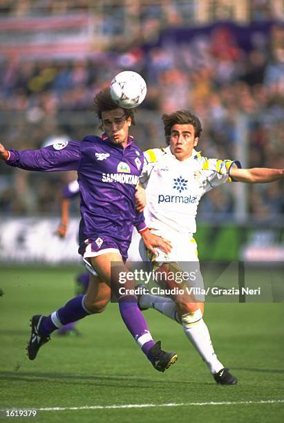 Gabriel Batistuta of Fiorentina and Fabio Cannavaro of Parma in action during the Serie A match at the Stadio Tardini, Parma. \ Mandatory Credit:...