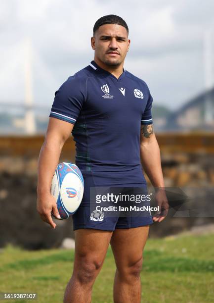 Sione Tuipulotu poses for photographs during the squad announcement prior to the Rugby World Cup on August 16, 2023 in South Queensferry, Scotland.