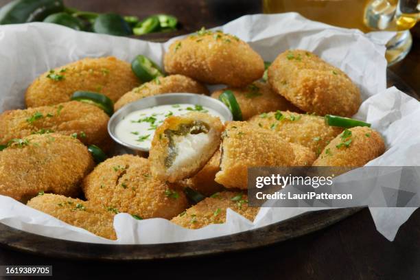 crispy breaded jalapeno poppers - jalapeno pepper stock pictures, royalty-free photos & images