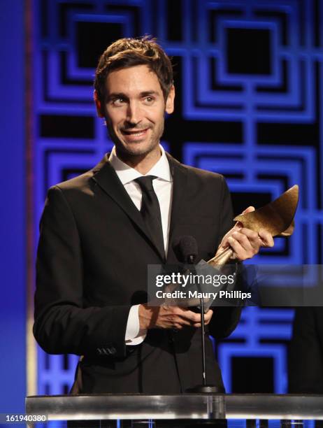 Writer Malik Bendjelloul accepts the Writers Guild Award for Documentary Screenplay onstage during the 2013 WGAw Writers Guild Awards at JW Marriott...