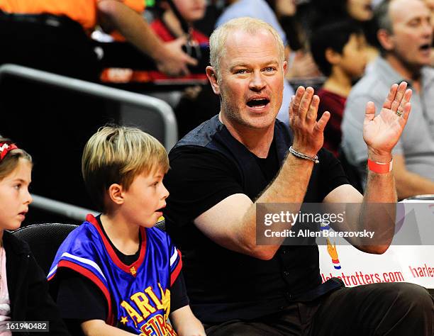 Actor Neal McDonough and son Morgan Patrick McDonough attend the Harlem Globetrotters "You Write The Rules" 2013 tour game at Staples Center on...