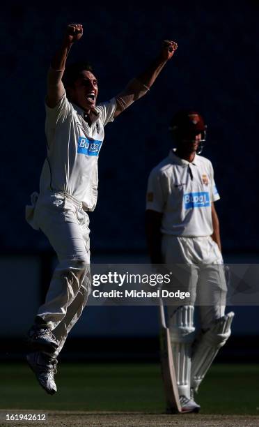 Will Sheridan of the Victorian Bushrangers celebrates his dismissal of Nathan Hauritz of the Queensland Bulls during day one of the Sheffield Shield...