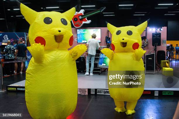 General view of two Pikachus is seen at the retro games section during the opening day of Gamescom at the Cologne Trade Fair Center in Cologne,...