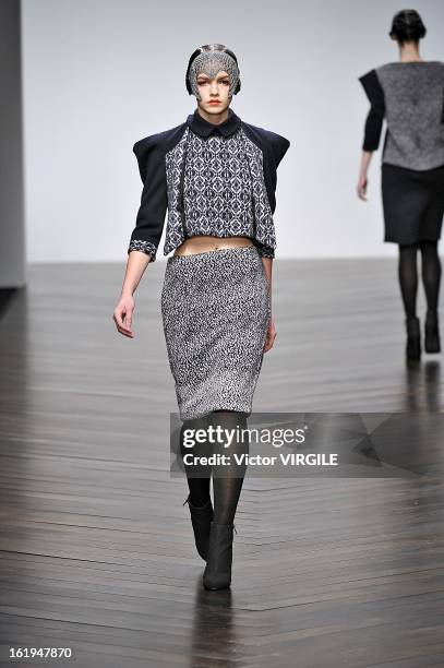 Model walks the runway during the Bora Aksu Ready to Wear Fall/Winter 2013-2014 show as part of the London Fashion Week Fall/Winter 2013/14 at...