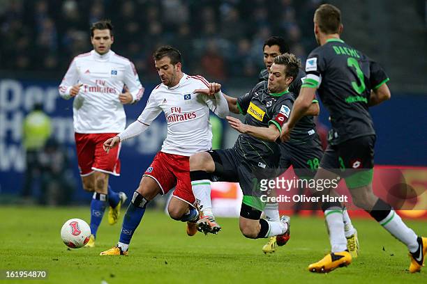 Rafael van der Vaart of Hamburg and Thorben Max of Gladbach battle for the ball during the Bundesliga match between Hamburger SV and Borussia...