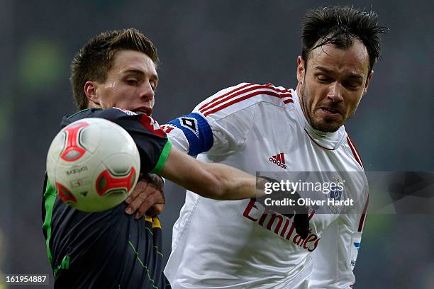 Heiko Westermann of Hamburg and Patrick Herrmann of Gladbach battle for the ball during the Bundesliga match between Hamburger SV and Borussia...