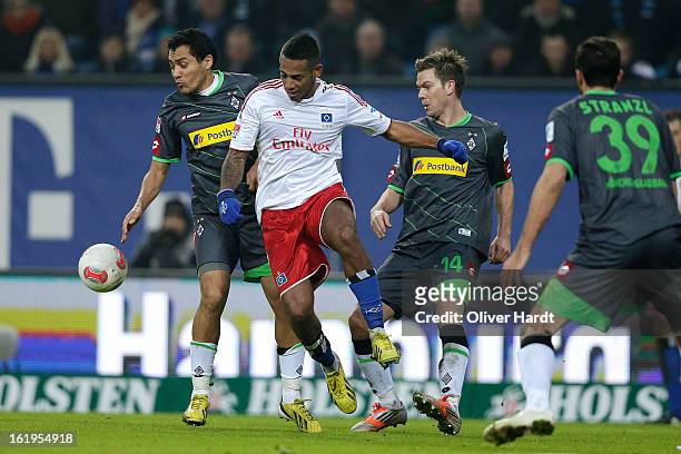 Dennis Aogo of Hamburg and Juan Arango of Gladbach battle for the ball during the Bundesliga match between Hamburger SV and Borussia Moenchengladbach...