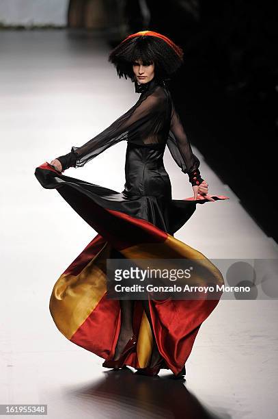 Model showcases designs by Francis Montesinos on the runway at the Francis Montesinos show during Mercedes Benz Fashion Week Madrid Fall/Winter...
