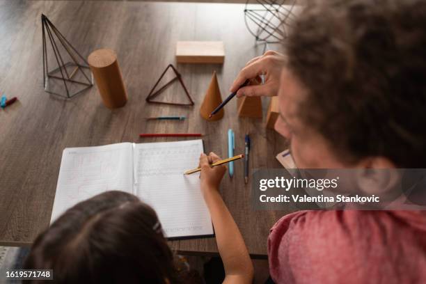 sometimes elementary school children need help with homework - v cube 8 stock pictures, royalty-free photos & images