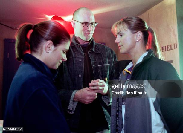 United States Soccer Team members Mia Hamm and Brandi Chastain with Director John Dolan during filming a commercial, January 18, 2001 in Los Angeles,...