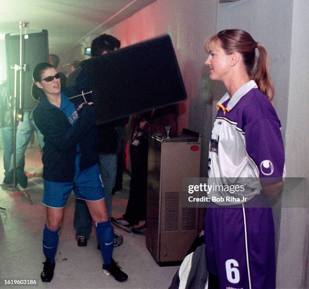 United States Soccer Team members Mia Hamm and Brandi Chastain film a commercial, January 18, 2001 in Los Angeles, California.