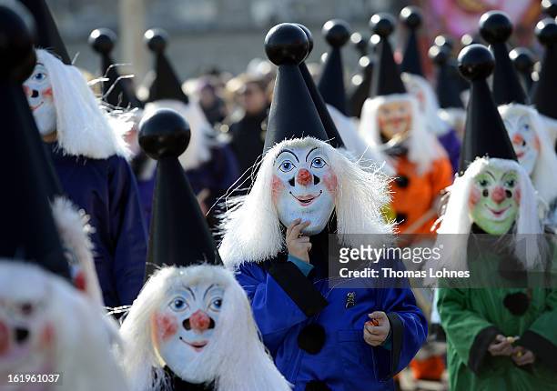 Young performes take part at the "cotage" of the Basel Fasnacht Carnival on February 18, 2013 in Basel, Switzerland. More than 12,000 participants...