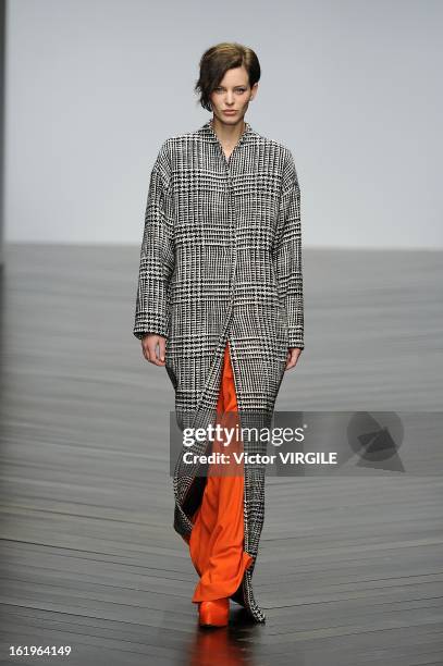 Model walks the runway during the Zoe Jordan Ready to Wear Fall/Winter 2013-2014 show as part of the London Fashion Week Fall/Winter 2013/14 at...