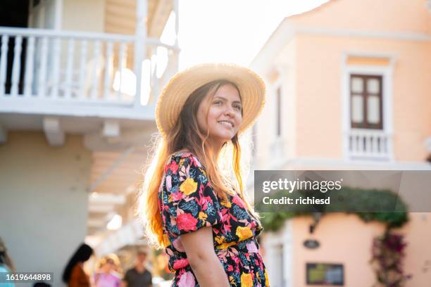 a young woman traveling enjoying cartagena - cartagena colombia stock pictures, royalty-free photos & images