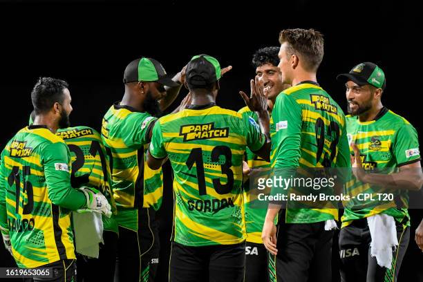 Salman Irshad and Mohammad Amir of Jamaica Tallawahs celebrate the dismissal of Corbin Bosch of Saint Kitts and Nevis Patriots during the Men's 2023...