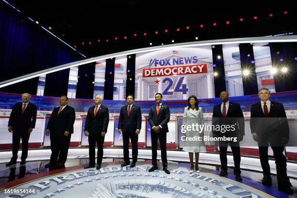 Republican presidential candidates Asa Hutchinson, from left, Chris Christie, former Vice President Mike Pence, Ron DeSantis, Vivek Ramaswamy, Nikki...