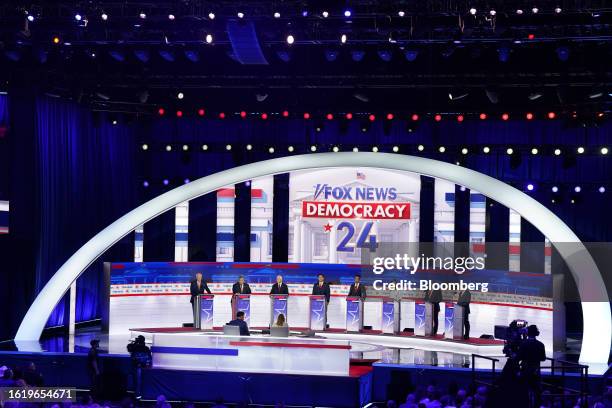 Republican presidential candidates Asa Hutchinson, from left, Chris Christie, former Vice President Mike Pence, Ron DeSantis, Vivek Ramaswamy, Nikki...