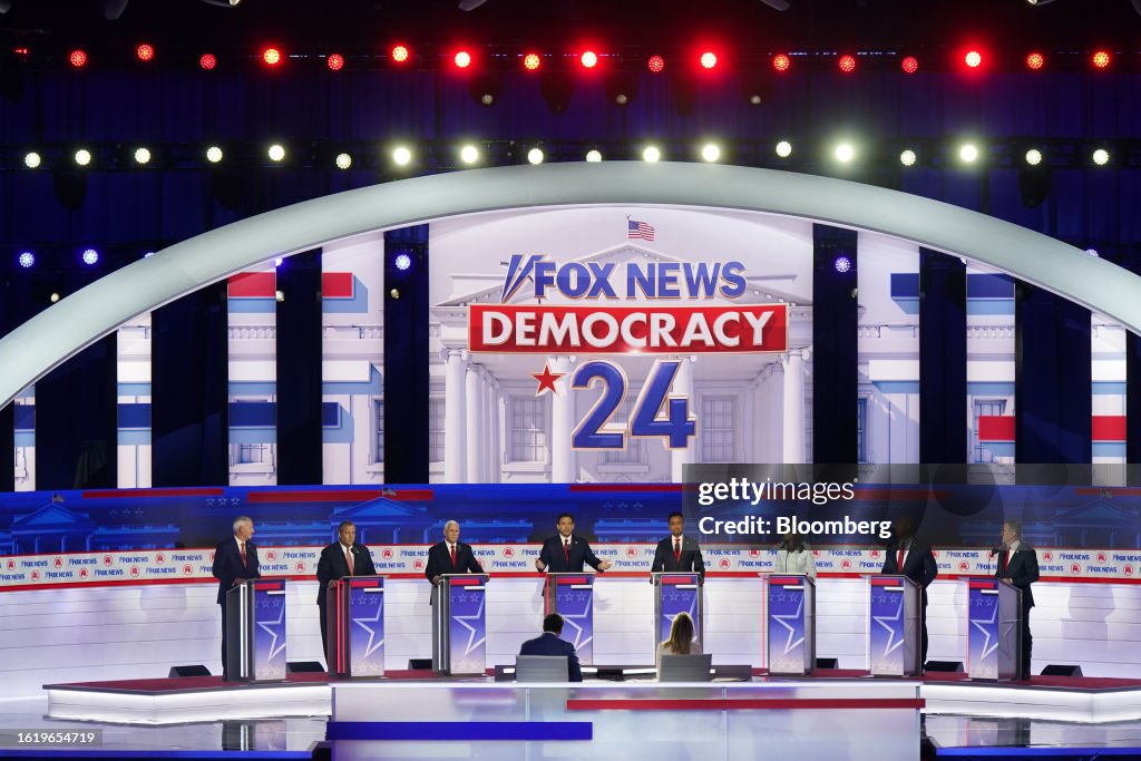 Republican presidential candidates Asa Hutchinson, from left, Chris