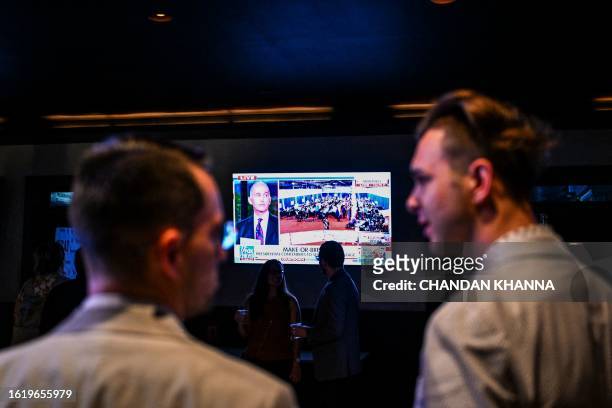 Members of the Atlanta Young Republicans attend a watch party of the first Republican Presidential primary debate at a bar in Atlanta, Georgia on...