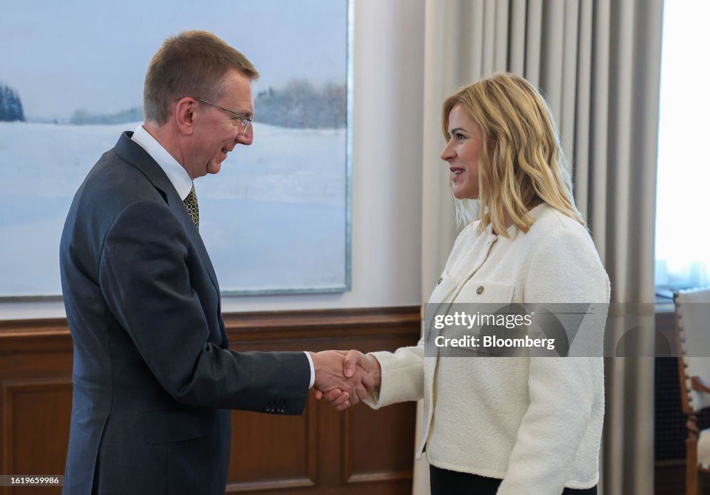 Edgars Rinkevics, Latvia's president, left, and Evika Silina,... News