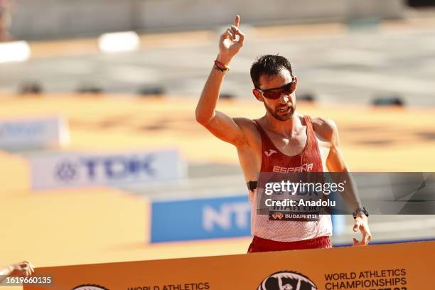 Alvaro Martin of Team Spain celebrates as he crosses the finish line to win the Men's 35 Kilometres Race Walk Final during day six of the World...