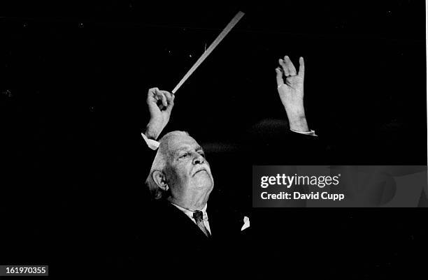 Boston pops conductor Arthur Fiedler starts Denver symphony concert.;