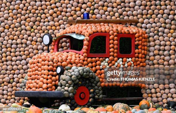 Fire engine made of pumpkins is seen at a pumpkin exhibition in the garden of Ludwigsburg Castle in Ludwigsburg, southern Germany, on August 24,...