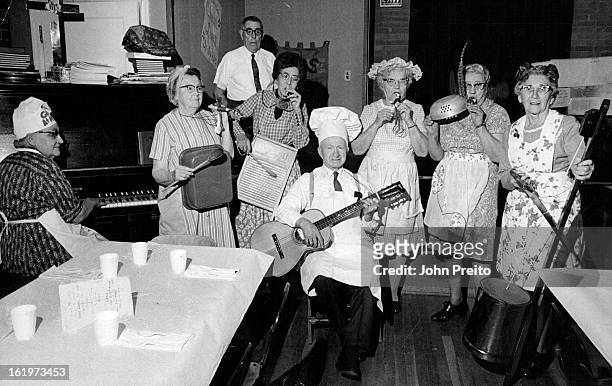 Retired Persons Perform As A "Culinary Band"; Members, from left, are Mrs. Daisy Blom, piano; Mrs. Genevieve Bailey, dish pan; Miss Thais Lampe,...
