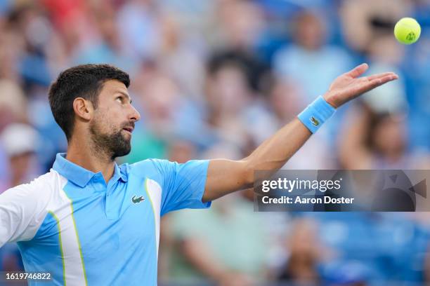 Novak Djokovic of Serbia serves to Alejandro Davidovich Fokina of Spain during their match at the Western & Southern Open at Lindner Family Tennis...