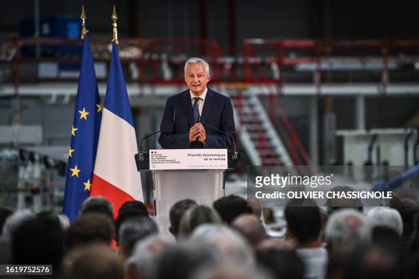 French Minister for the Economy and Finances Bruno Le Maire delivers a speech in the new factory of French company Groupe Fournier in Alex, near...