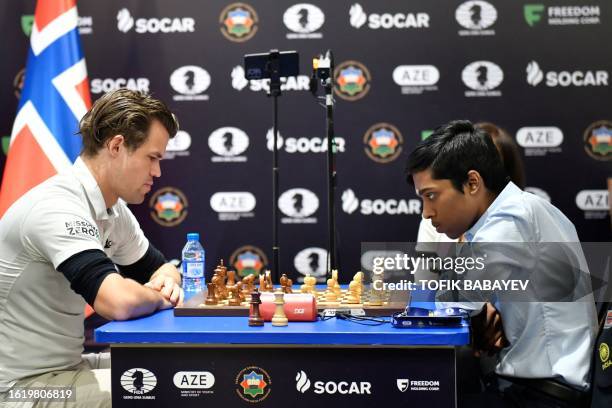 India's Rameshbabu Praggnanandhaa competes against Norway's Magnus Carlsen during the final at the FIDE Chess World Cup in Baku on August 24, 2023.