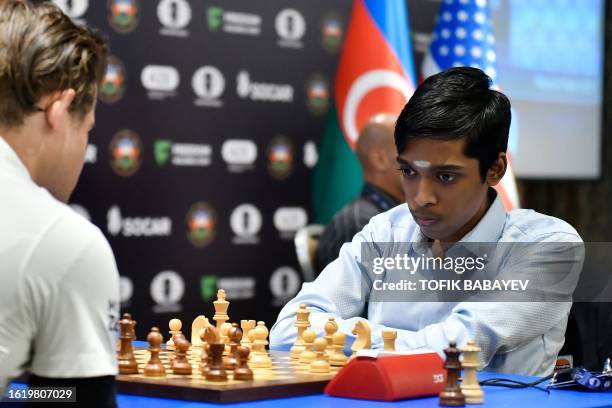 India's Rameshbabu Praggnanandhaa competes against Norway's Magnus Carlsen during the final at the FIDE Chess World Cup in Baku on August 24, 2023.