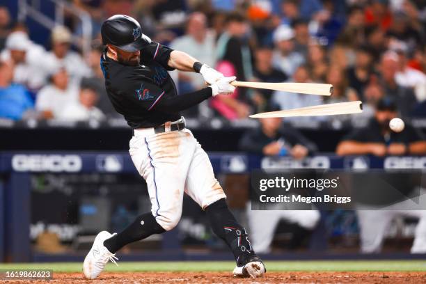 Jon Berti of the Miami Marlins breaks his bat against the Houston Astros during the sixth inning at loanDepot park on August 16, 2023 in Miami,...