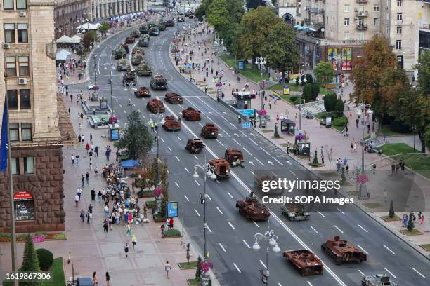 Top view of samples of destroyed Russian military land vehicles displayed on Khreschatyk Street during an exhibition in Kyiv. Various exhibits of...