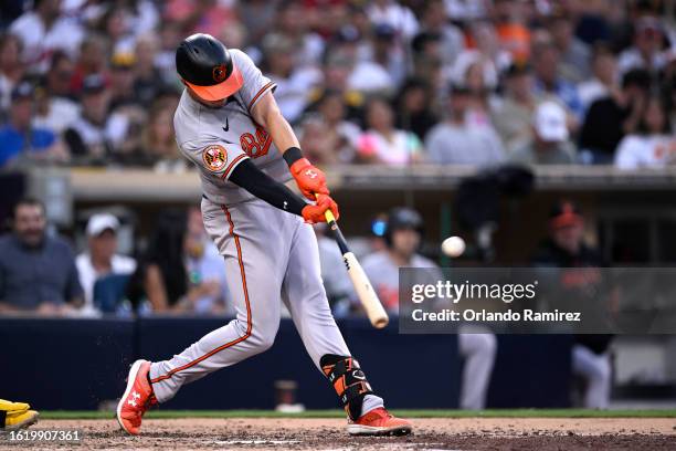 Ryan Mountcastle of the Baltimore Orioles hits a home run against the San Diego Padres during the sixth inning at PETCO Park on August 16, 2023 in...