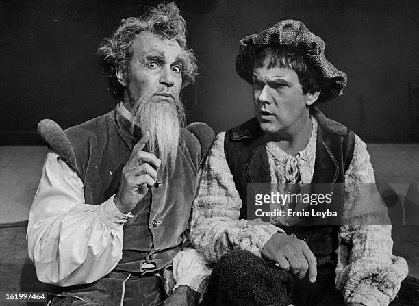 Buddy Greene, left, as Don Quixote, and Frank Bauer, as Sancho, discuss windmills in "Man of La Maneha," Bonfils' final show of the season. Musical...