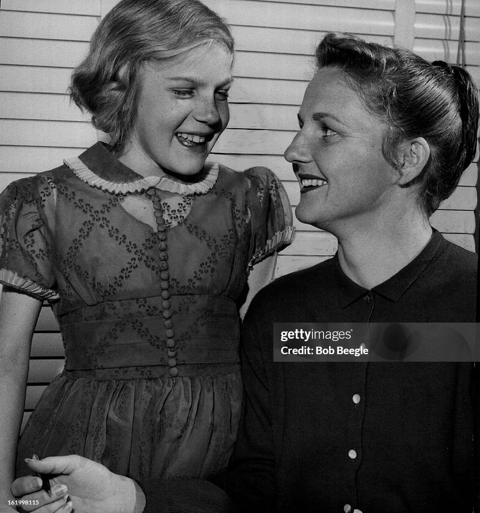 FEB 19 1957, FEB 20 1957; McCormick, Pat; spts file 5p; Lolly Bittner, 11, and Pat McCormick; Swimmi